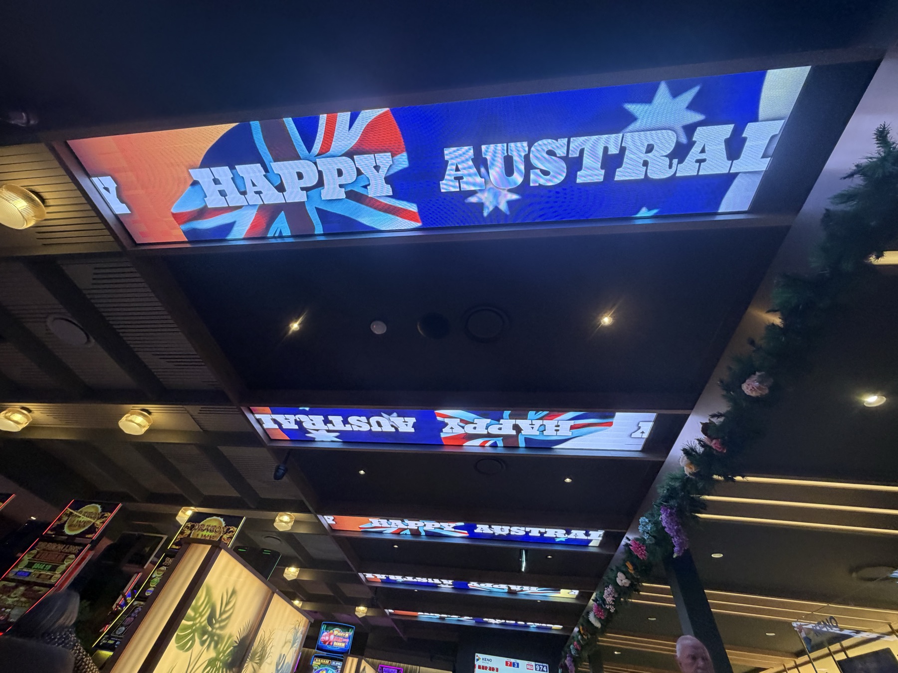 Long LED ceiling strips over the floor carrying an Australia Day flag animation